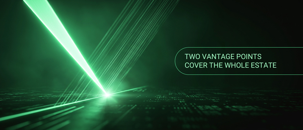 Two intersecting beams of light converging on a dark green, data-etched surface, illustrating two vantage points covering one IT estate